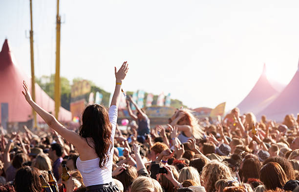 Festival Crowd: A vibrant audience enjoying the Talent Festival 2025 with lights, music, and excitement